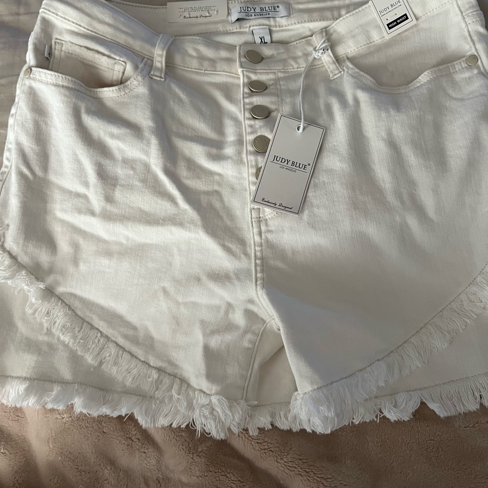 White Judy blue shorts.
